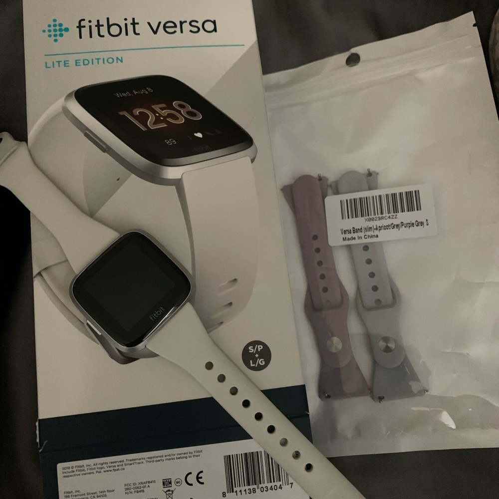 Fitbit versa with 3 extra bands
